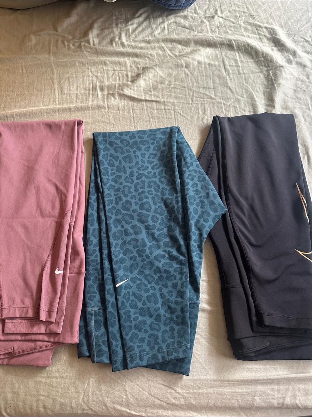 Nike Women’s 3-Pack Leggings in Mauve, Teal Leopard & Black